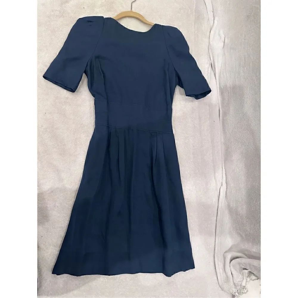 Navy Dress women’s size M with bows on the back by brand BIBA